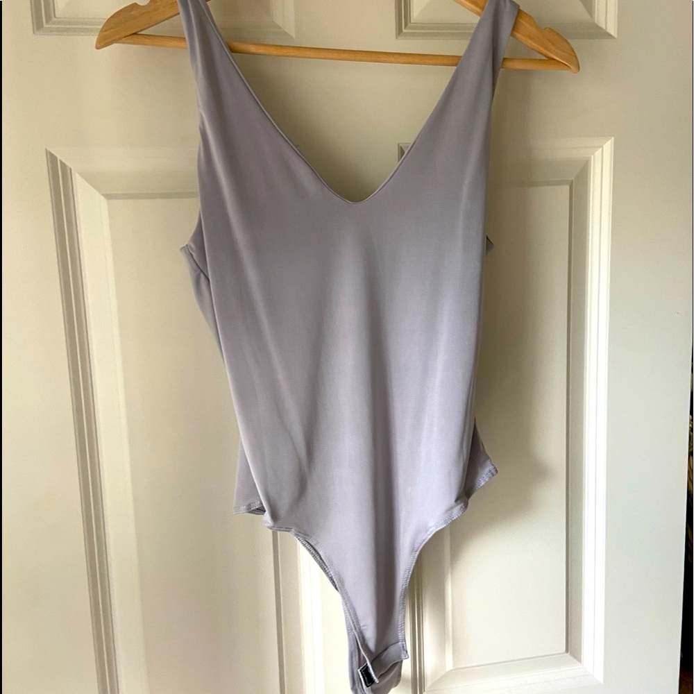 Missguided body suit. Size 6. Silver